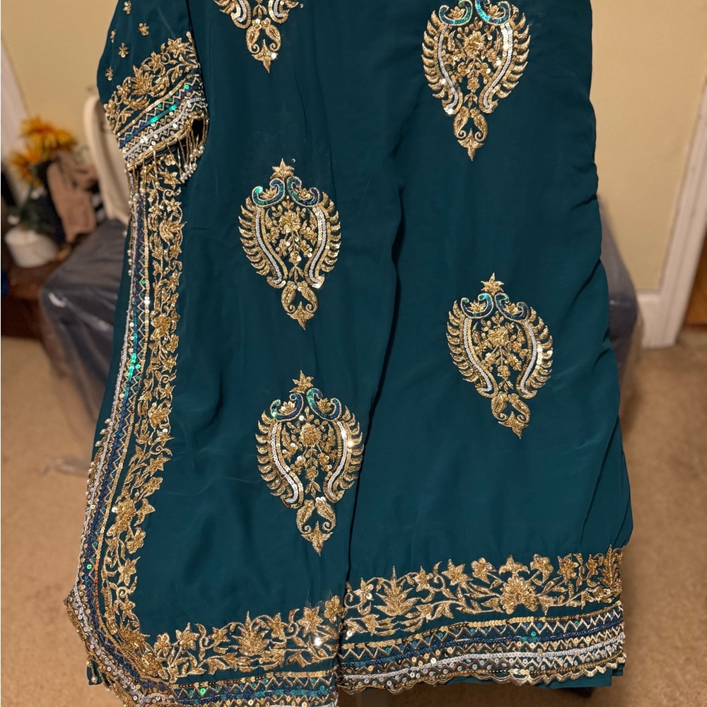 Elegant Teal and Gold Embroidered sari